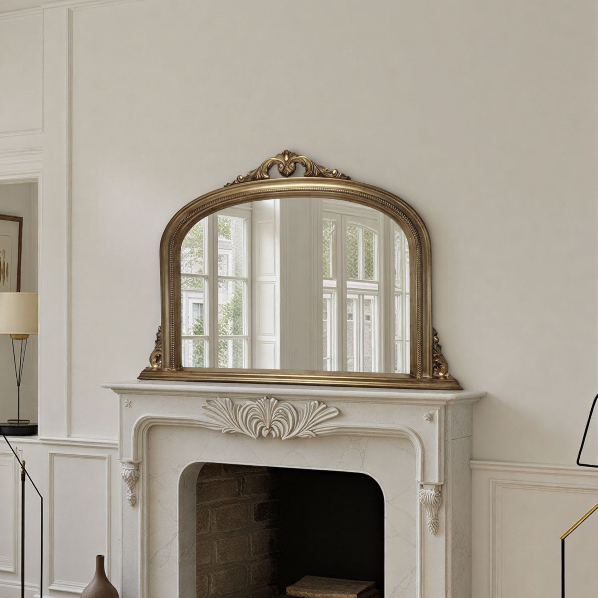 Decorative antique gold overmantle mirror