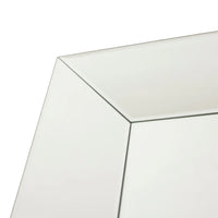 Corner of a rectangular mirror with a black frame on a white background