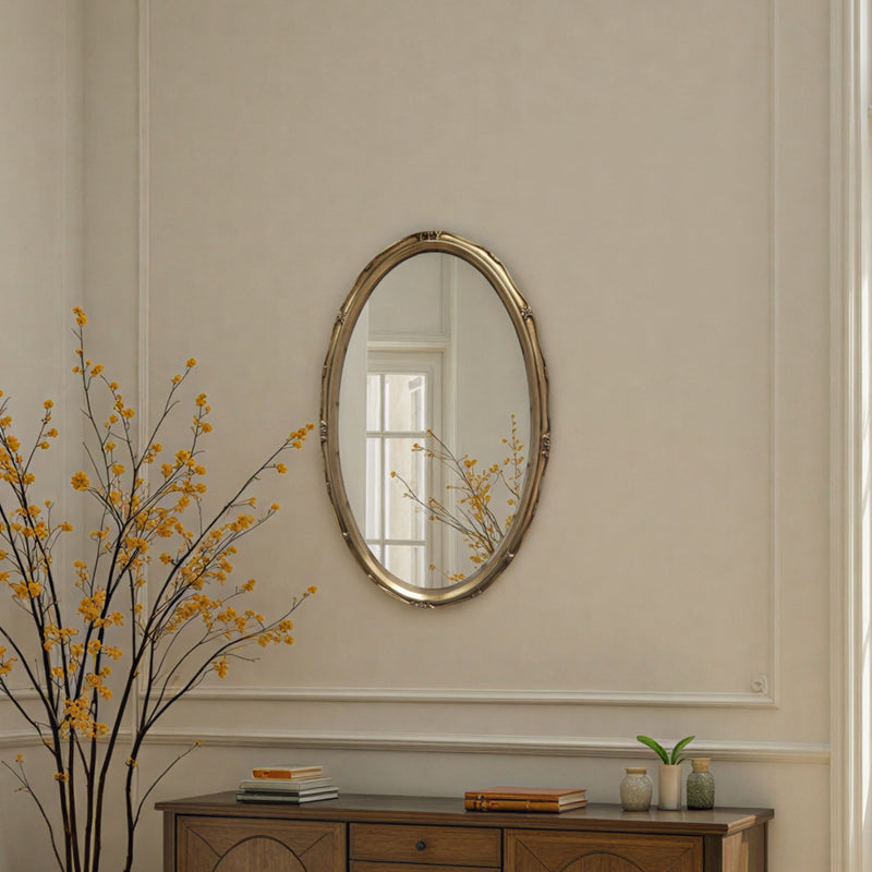 oval gold mirror