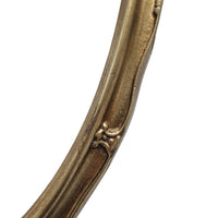 oval gold mirror