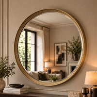 Large round gold mirror